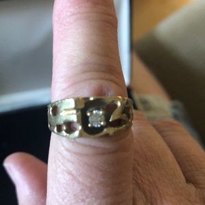 14k Gold and diamond ring.